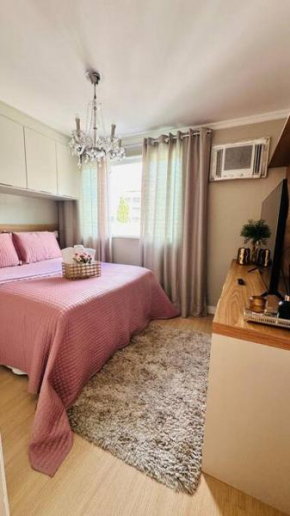 Apartamento novo sofisticado no centro da cidade com garagem